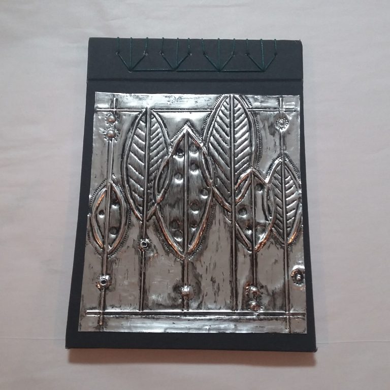 Student showcase: metal embossed Japanese stab bound sketchbooks